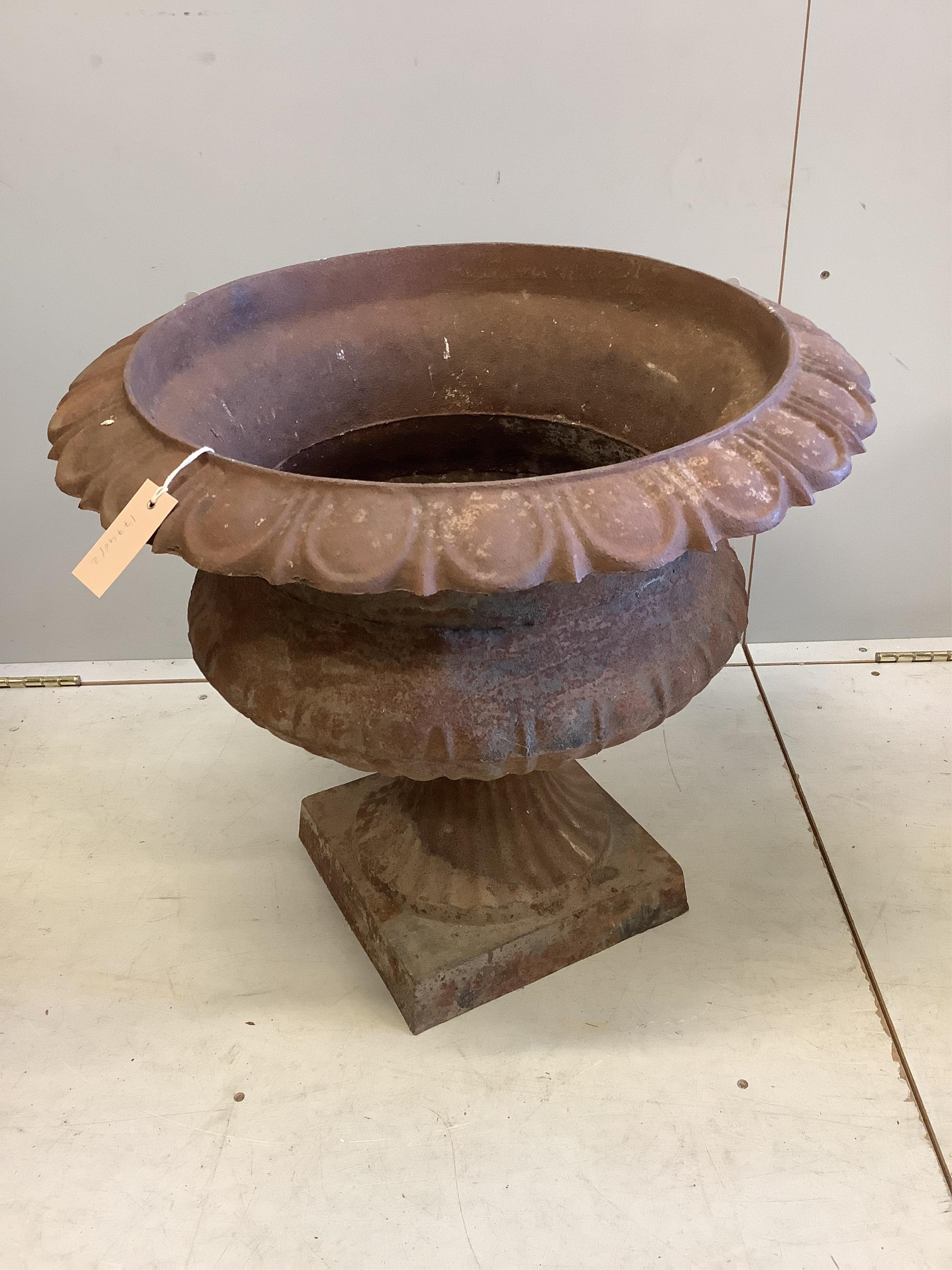 A pair of Victorian cast iron campana garden urns, diameter 60cm, height 53cm